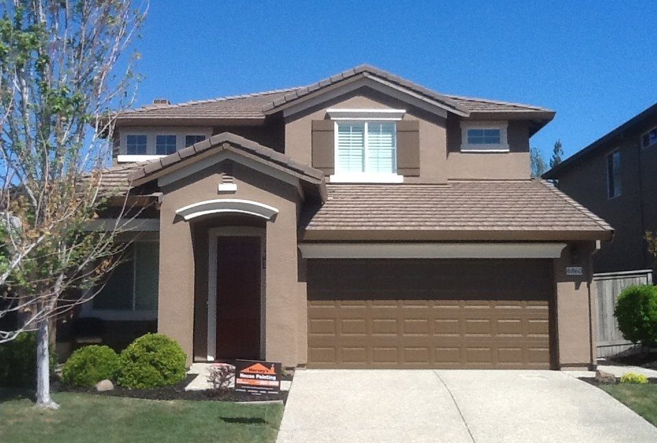 Home exterior painted in a warm neutral
